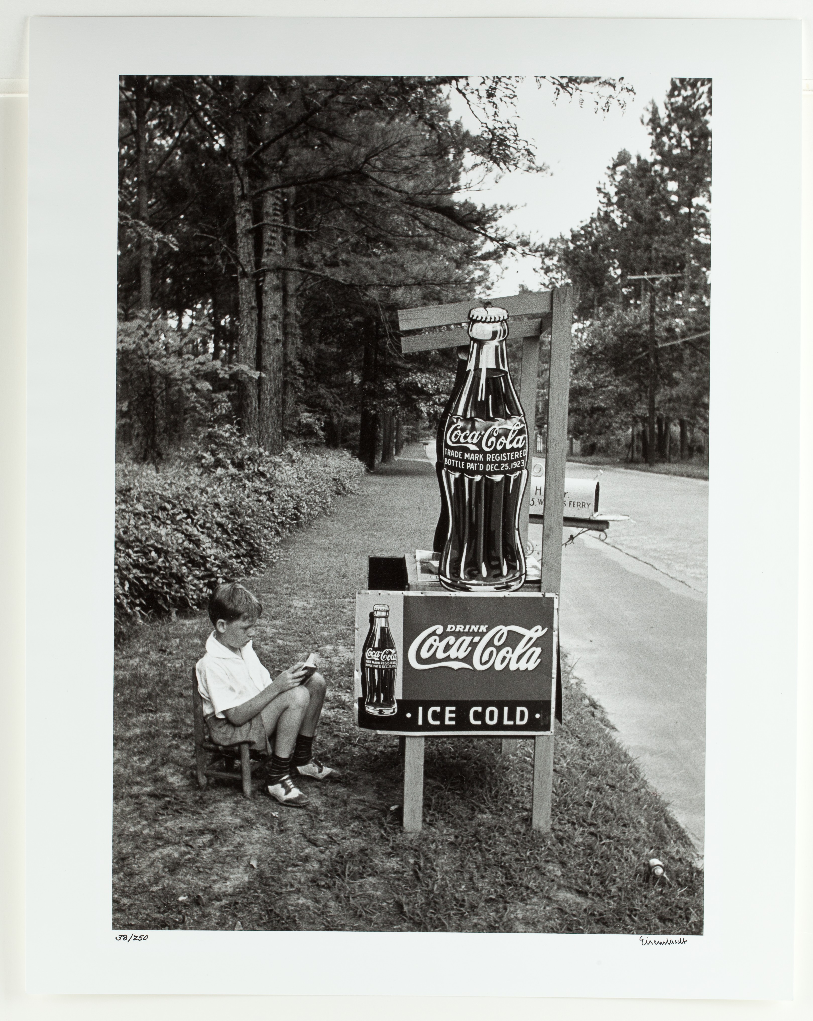 Alfred Eisenstaedt (American (b. Germany), 1898–1995), Little Boy Selling Coca-Cola at Roadside, Atlanta, Ga., 1936, gelatin silver print. Collection of The Coca-Cola Company.